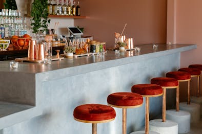 15 Restaurants With Action At The Bar feature image