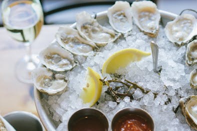 The Best Oyster Happy Hours In NYC feature image