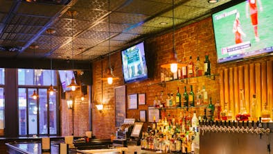The Best Places To Watch Sports In NYC feature image