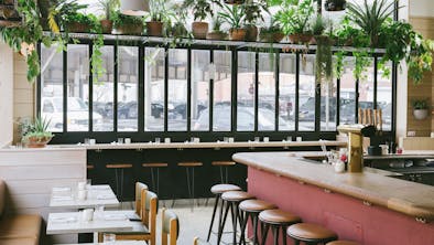 16 Restaurants With Action At The Bar feature image