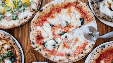 Where To Get Pizza Takeout & Delivery In Chicago feature image